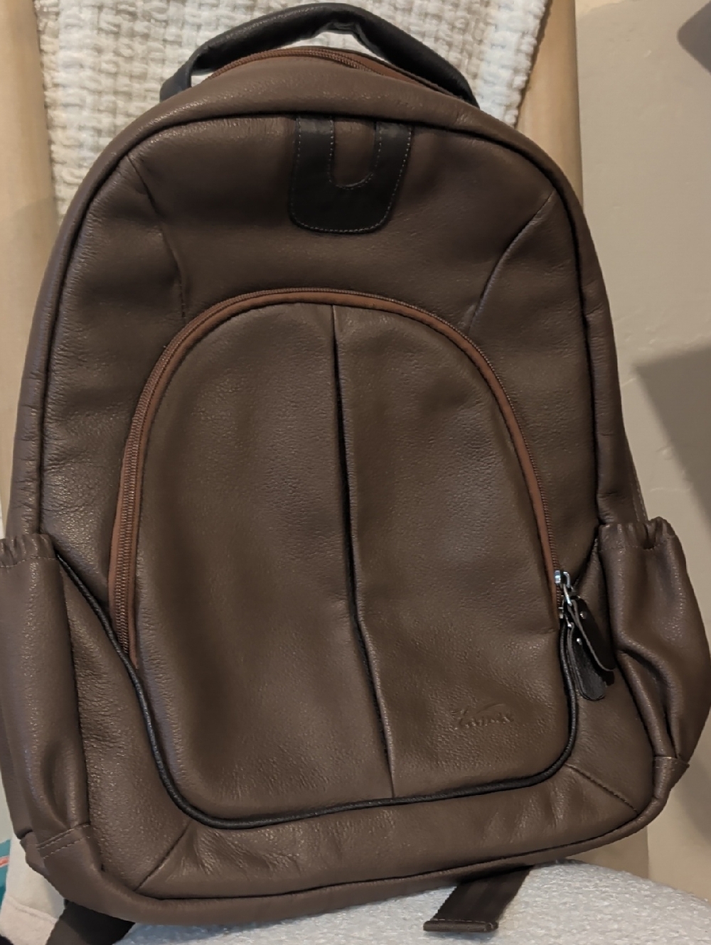 Zamee Brown Backpack.    Excellent New Condition